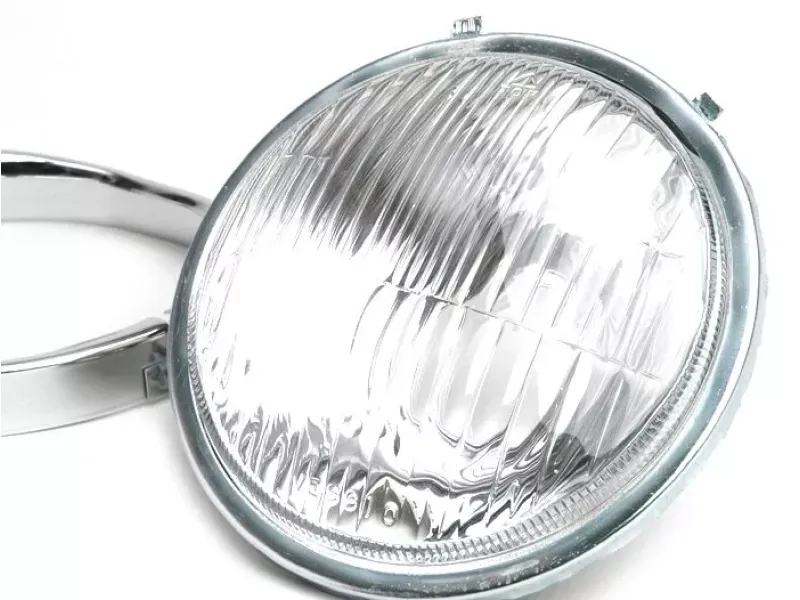 koplamp  vespa ø=115mm  vespa ss50 (v5ss1t), 50sr (v5ss2t), ss90 (v9ss1t), 90 racer (v9ss2t), pv125 (vma1t, vma2t), et3 vmb1t), super (vnc1t/vbc1t)   glas, incl . koplamp rand